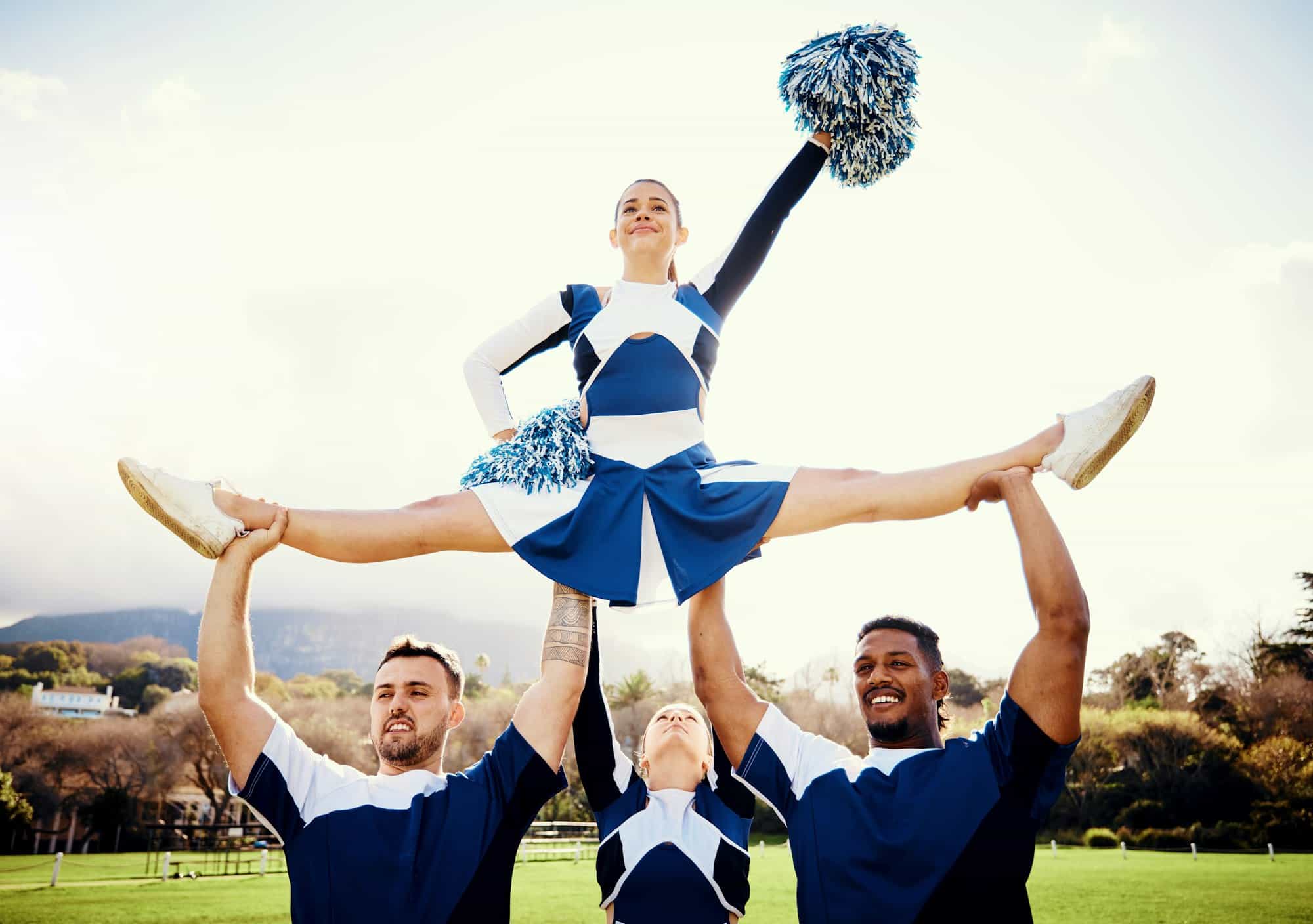 Sports woman, sky and cheerleader performance with smile and energy to celebrate outdoor. Cheerlead